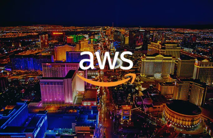 AWS logo over a city nightscape