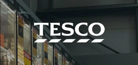 tesco logo over the top of an image from one of their shops