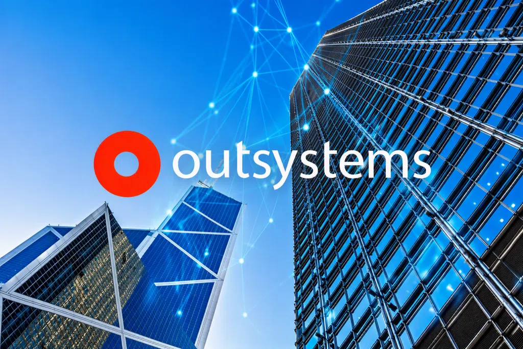 OutSystems logo displayed in front of modern glass skyscrapers viewed from a low angle. A reflective high-rise tower dominates the right side of the image, while angular office buildings rise on the left. Blue digital network lines and glowing connection points overlay the sky, representing cloud technology, application development, digital transformation, and enterprise connectivity.