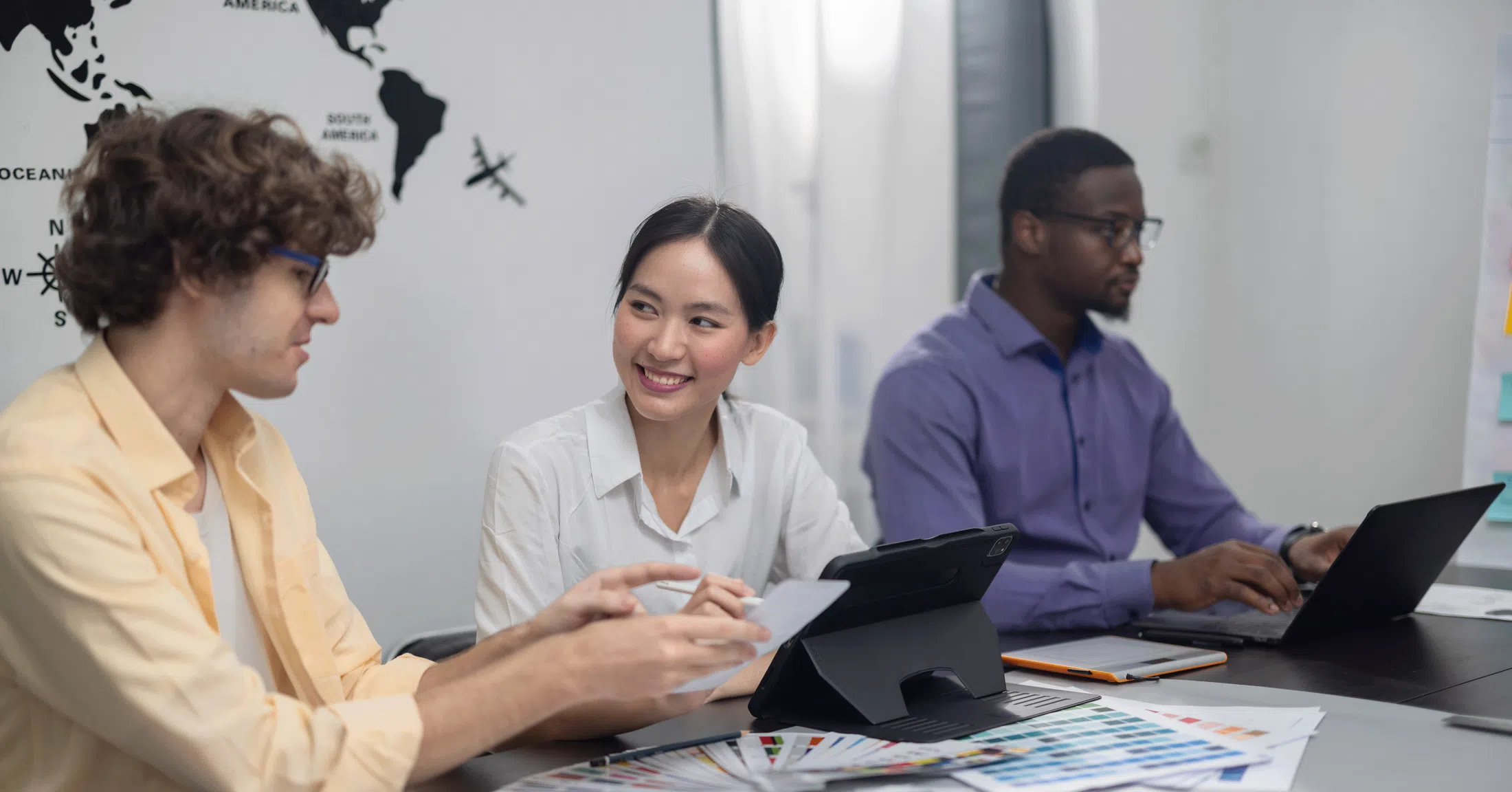 people working and discussing in a meeting