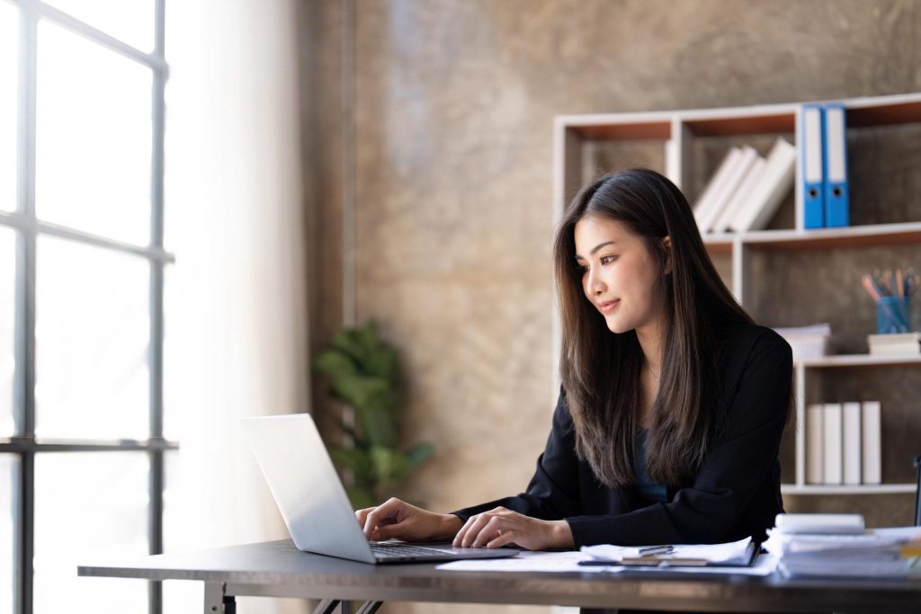 Woman working on laptop