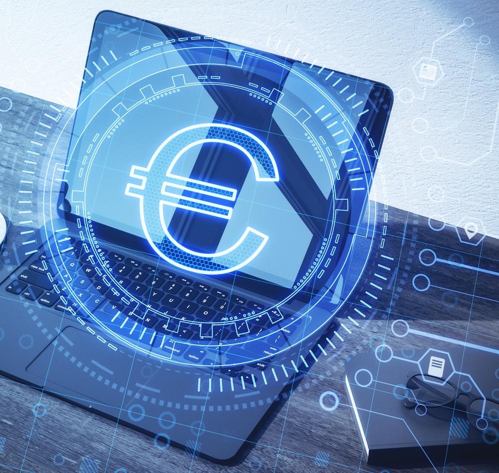 Laptop on a desk with a glowing euro (€) symbol overlaid in a futuristic interface, surrounded by digital dashboards and analytics graphics, representing AI-driven pricing models, cost optimisation, and automated financial decision-making in a modern tech environment.