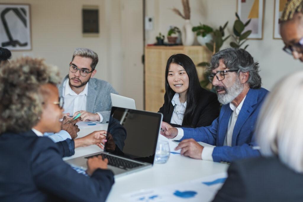 multiracial-business-people-working-inside-meeting