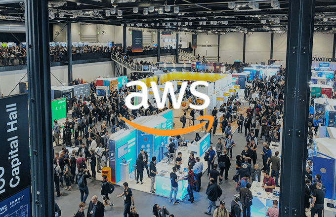 AWS logo over an image of a trade show