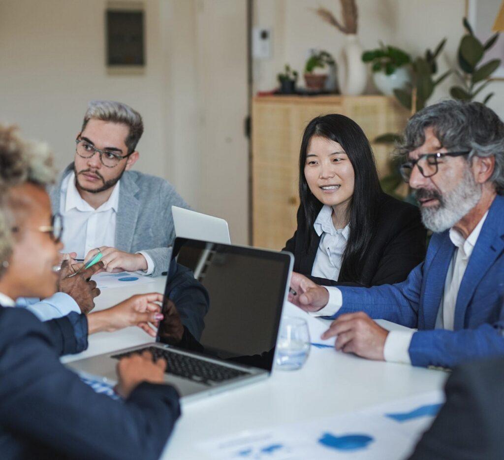 people working inside meeting
