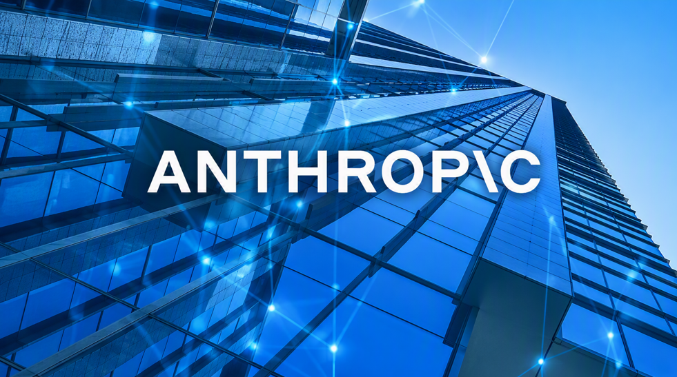 A dramatic low-angle view of a modern glass skyscraper stretching upward into a clear blue sky, overlaid with glowing blue network connections and light points that suggest digital connectivity, cloud computing, or artificial intelligence. Centered on the building façade is the word “ANTHROPIC” in large white capital letters. The image uses cool blue tones and reflective glass surfaces to convey a futuristic, technology-focused corporate brand aesthetic.